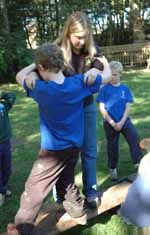 cub doing activity at camp